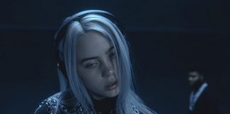 Billie Eilish e Khalid estão presos numa caixa de vidro no videoclipe de “Lovely”